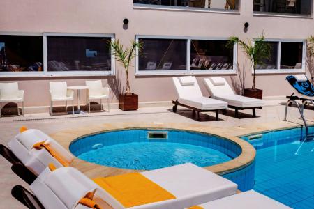 Porto Greco Village Beach Hotel інформація про готель та пошук турів в готелі Porto Greco Village Beach Hotel в Греції