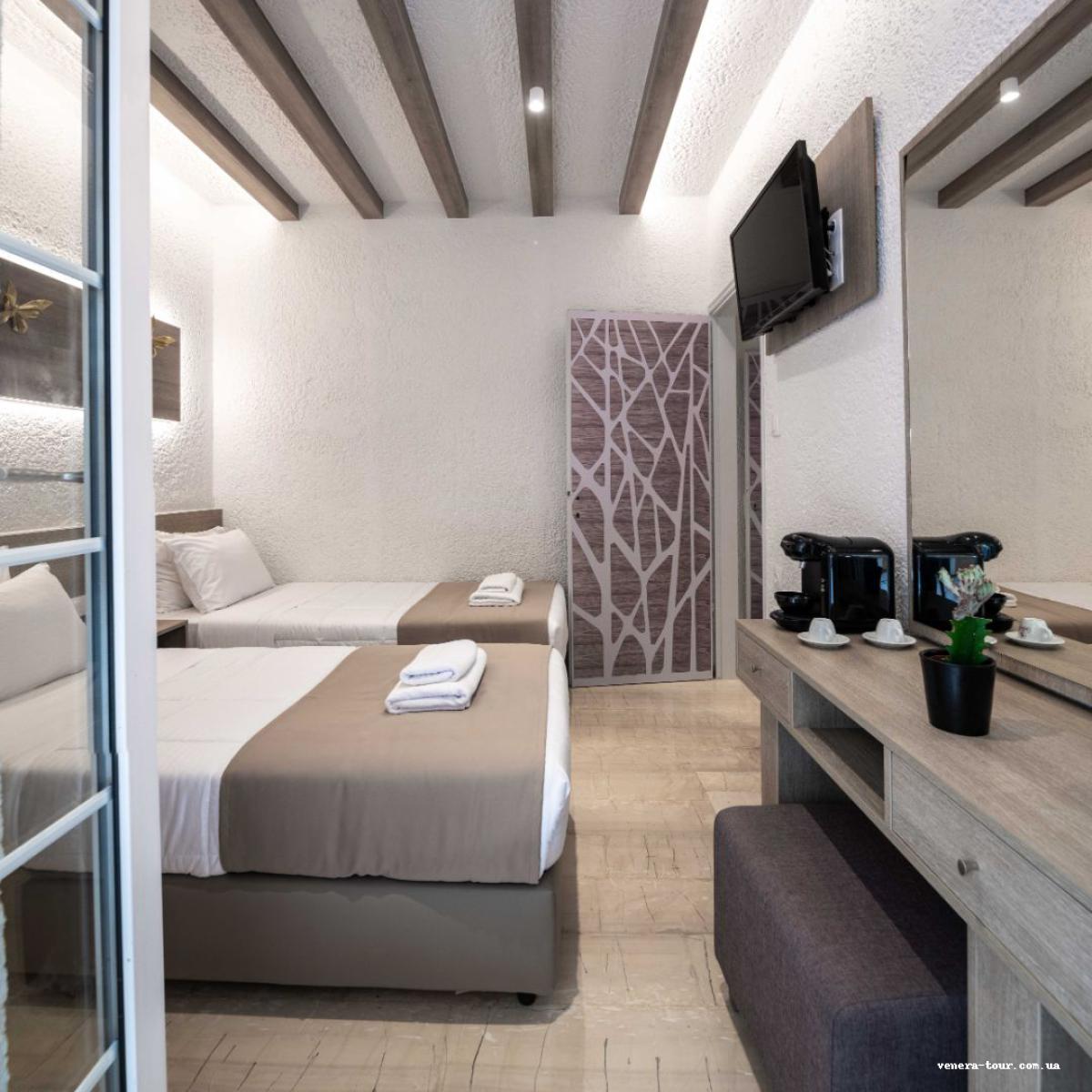 Porto Greco Village Beach Hotel інформація про готель та пошук турів в готелі Porto Greco Village Beach Hotel в Греції