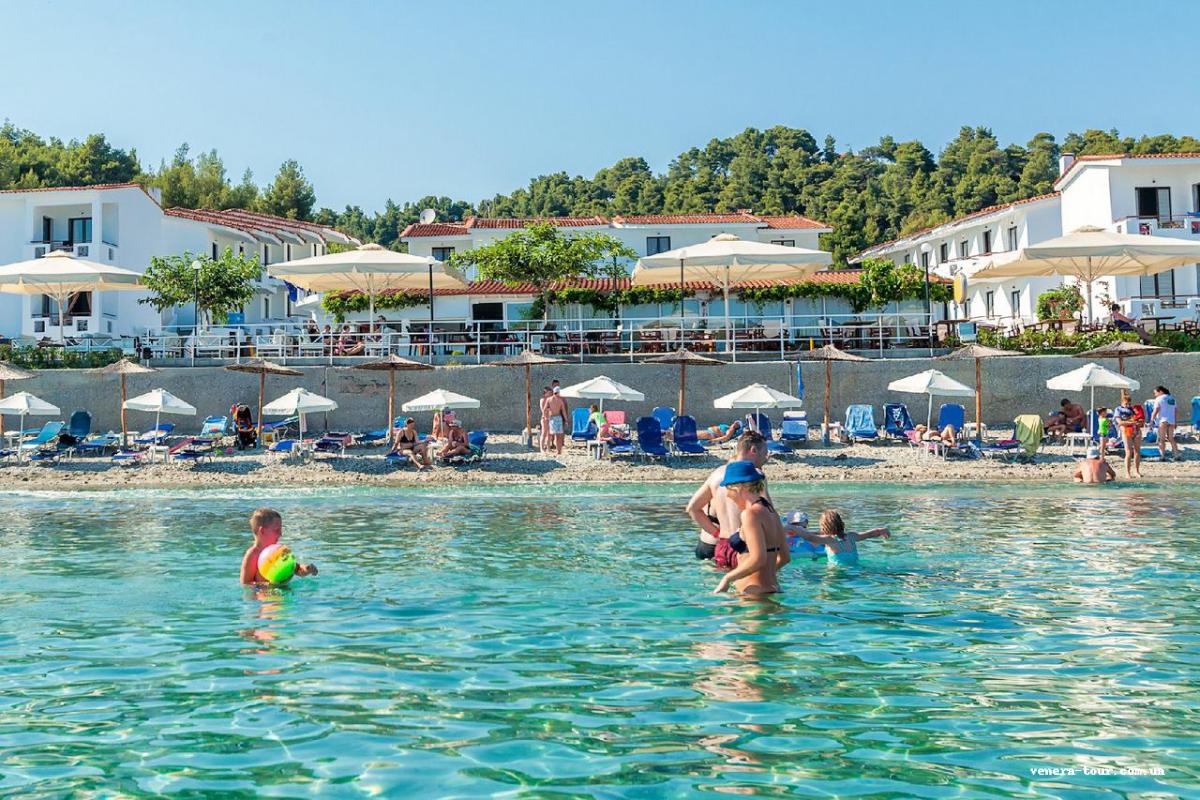 Xenios Dolphin Beach (Ex. Dolphin Beach) інформація про готель та пошук турів в готелі Xenios Dolphin Beach (Ex. Dolphin Beach) в Греції