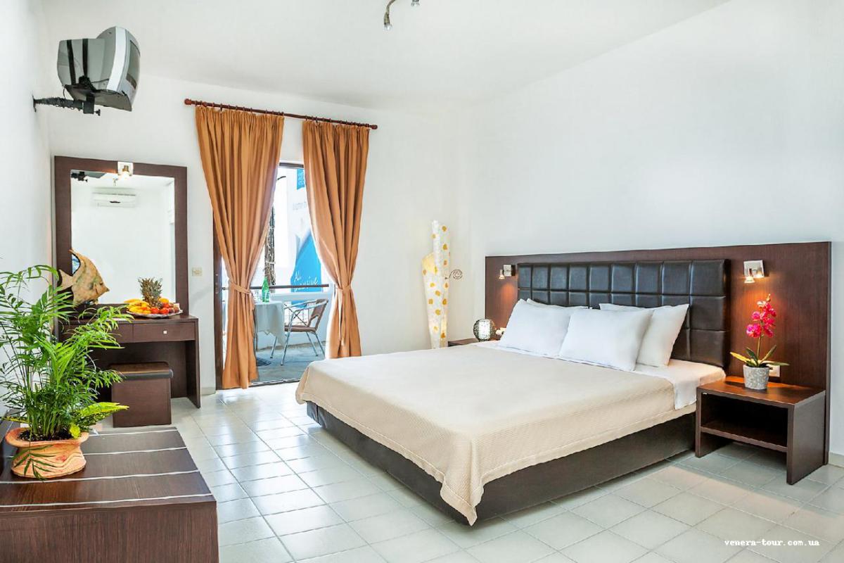 Xenios Dolphin Beach (Ex. Dolphin Beach) інформація про готель та пошук турів в готелі Xenios Dolphin Beach (Ex. Dolphin Beach) в Греції